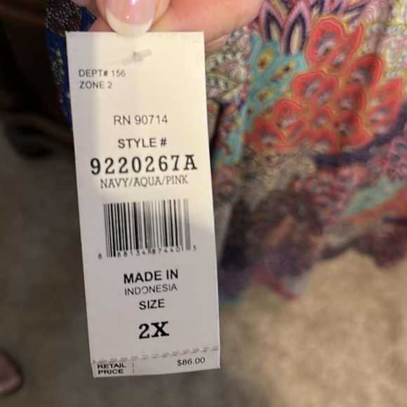 This is a soft boho midi dress with flutter sleeves.  Back has straps. - Picture 4 of 6